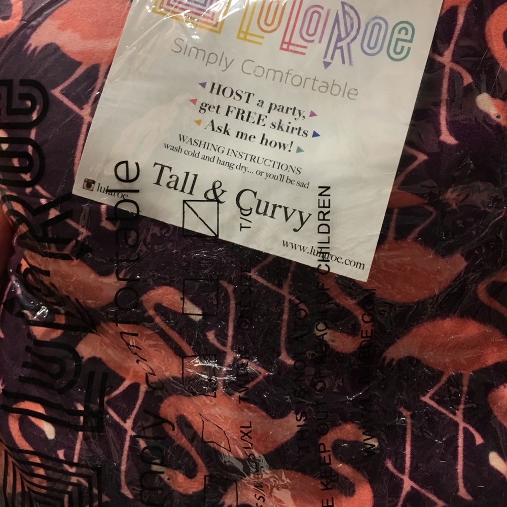Lularoe purple and pink flamingo leggings!