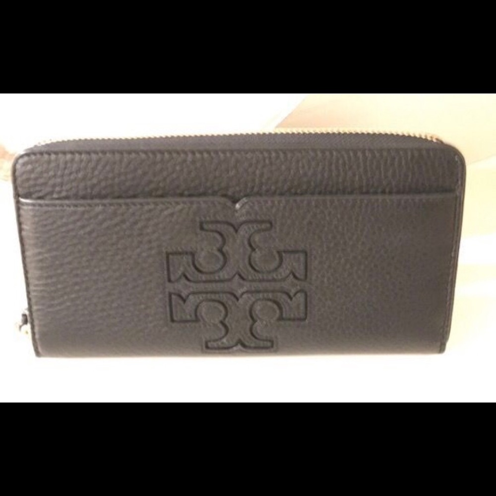 Brand new Tory Burch zip around wallet. Unused!