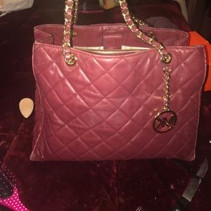 Beautiful Maroon Mk bag in great condition .