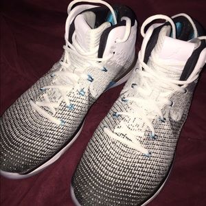 Selling White/Black/Turquoise Air Jordan xxx1s.