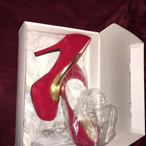 Red suede pumps