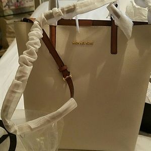 Brand new authentic large MK leather  purse. NWT