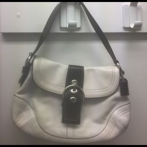 White and brown COACH handbag