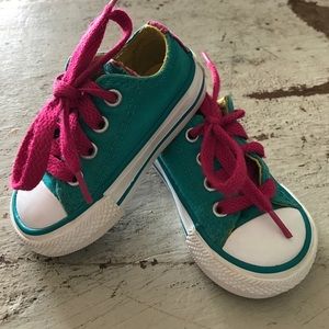 Toddler Converse multi-color shoes.