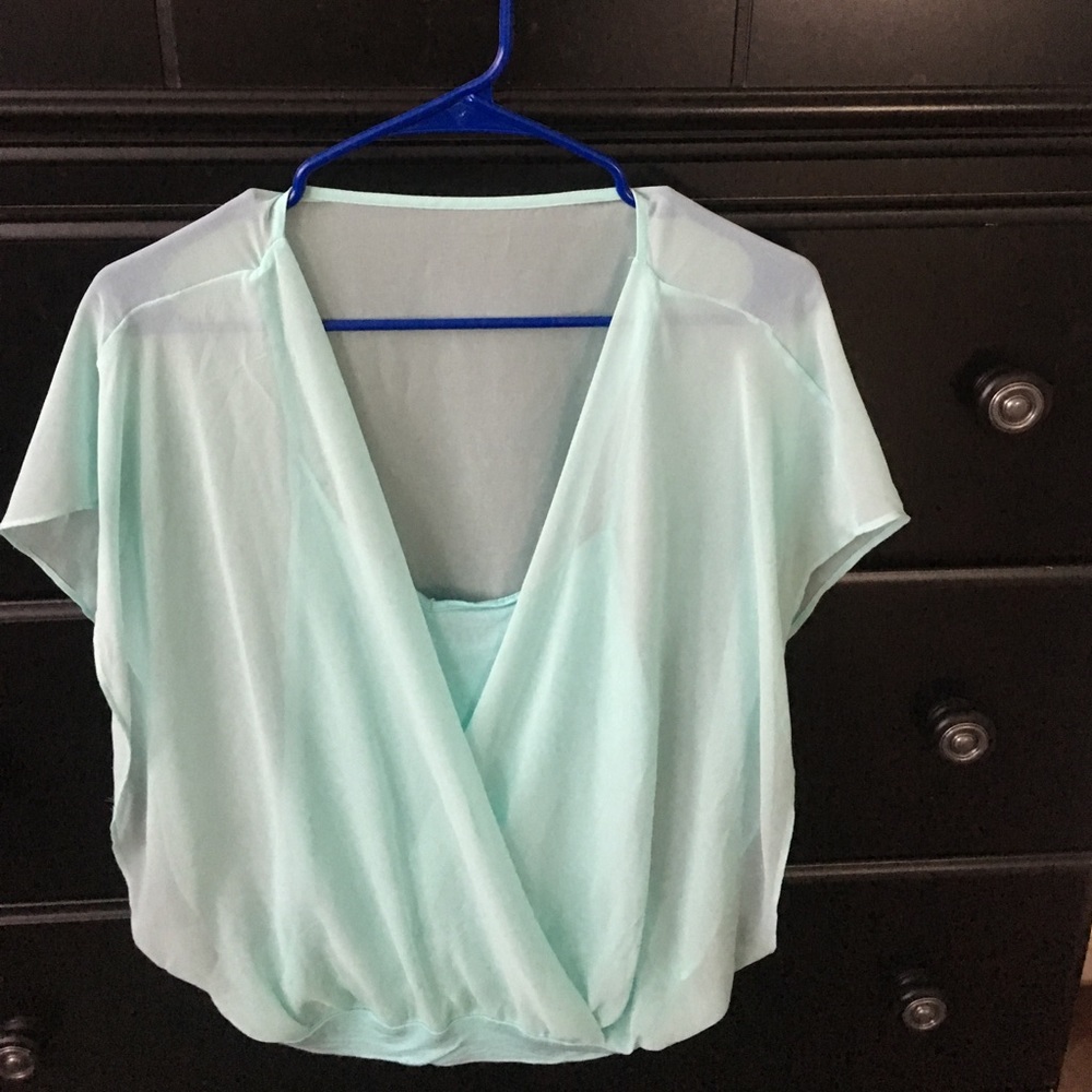 Sleeveless polyester like shirt with tank top