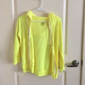 Neon yellow zip up jacket