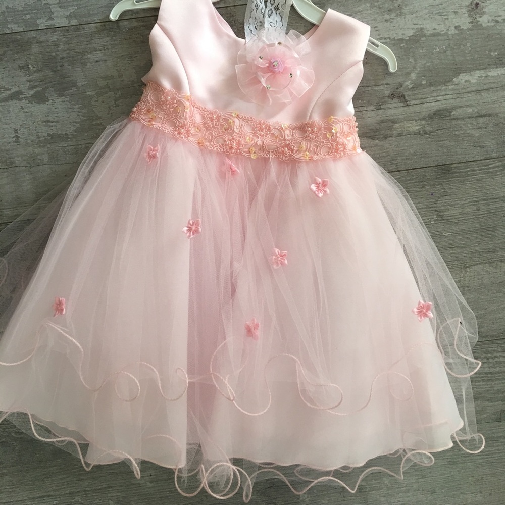 Pink tulle dress with floral detail