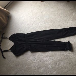 Black sleeveless jumpsuit