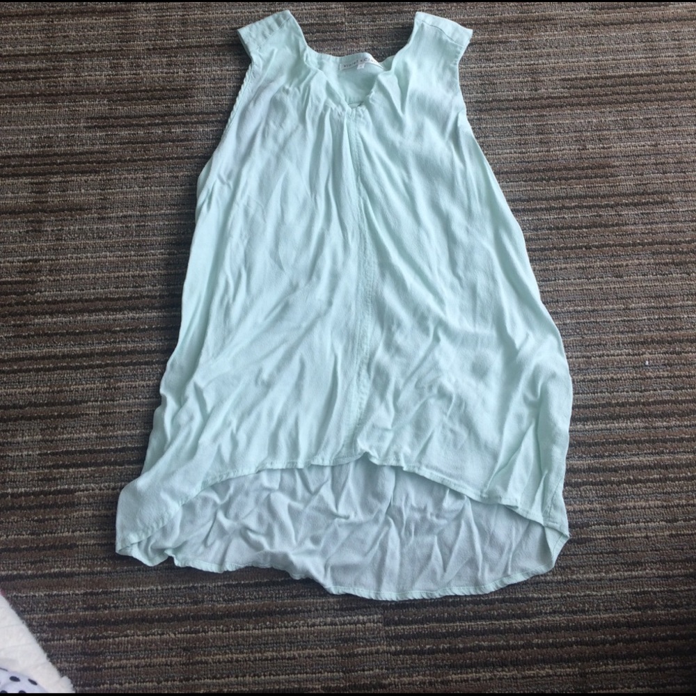 A light green tank top