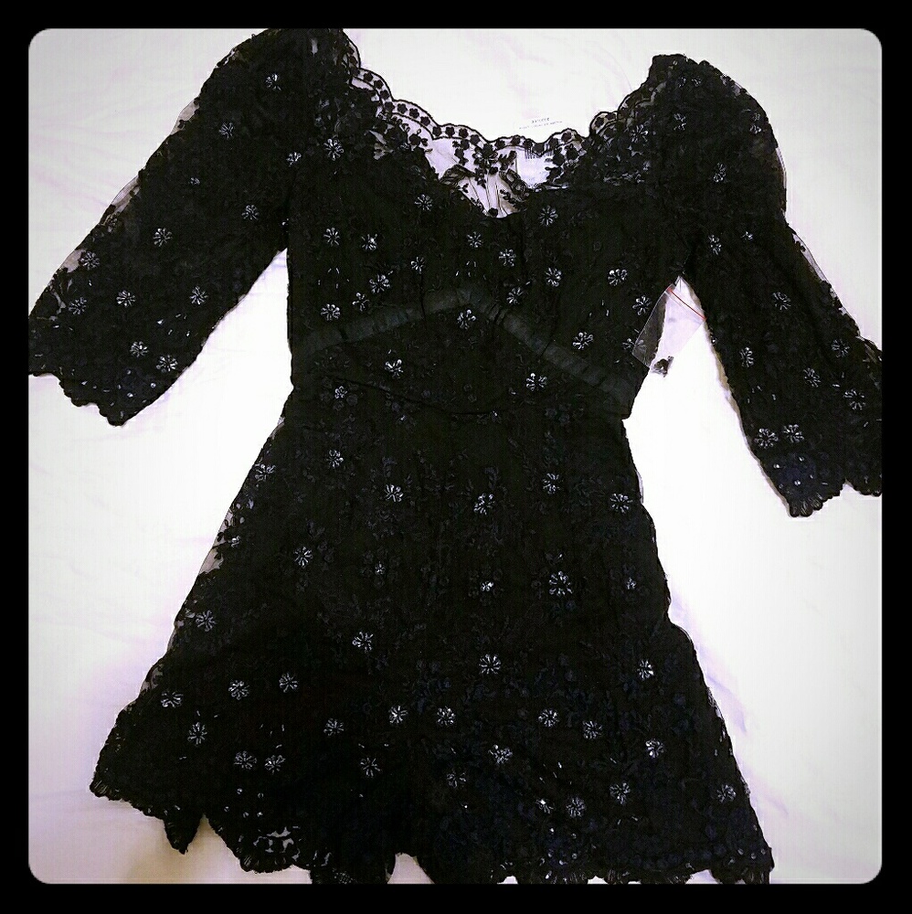 Free people Black Romper NWT size 6