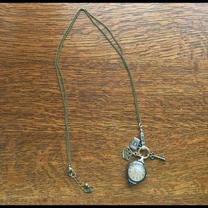 Anthropologie bronze British themed clock necklace