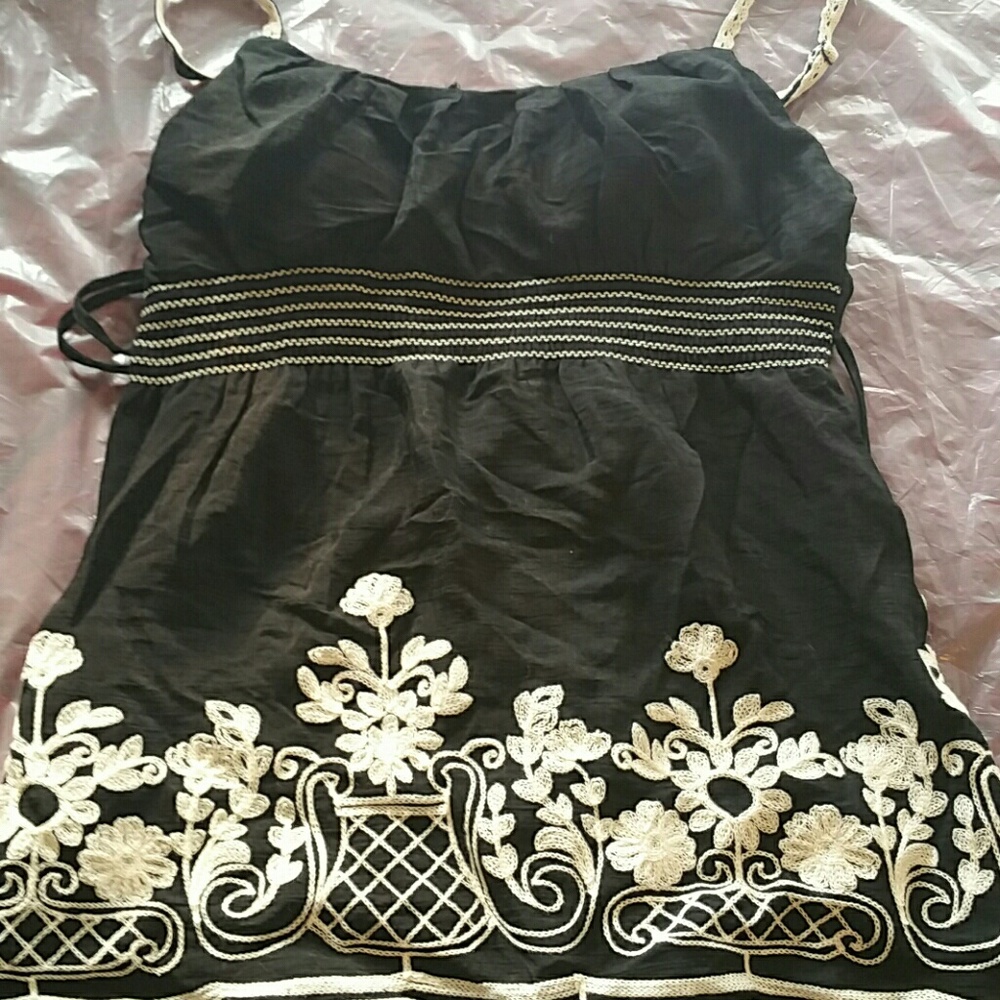 Baby doll sleeveless blouse