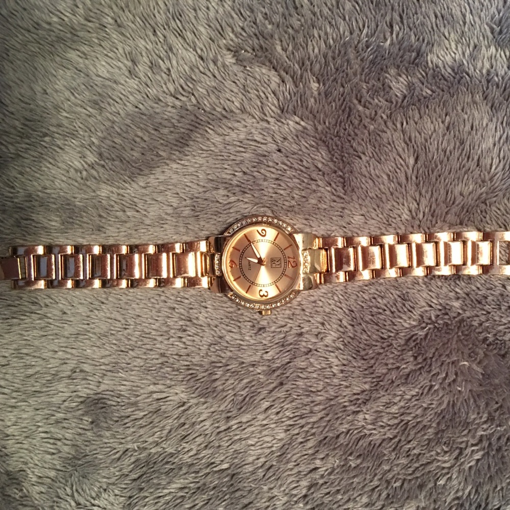Pretty rose gold/rhinestone watch.