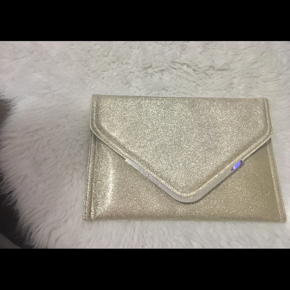 Beautiful clutch / gold !!! bcbgeneretion ✨✨✨
