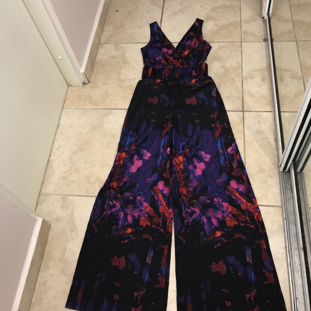 Bebe Print Jumpsuit with side Cut Outs