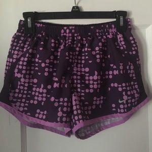 Purple polka dotted nike tempo run shorts