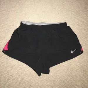 Black Nike running shorts
