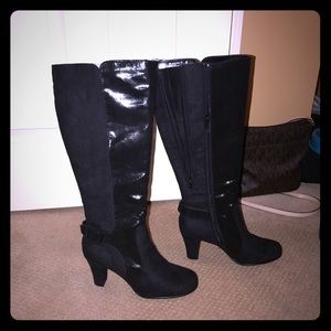 Knee high heeled boots