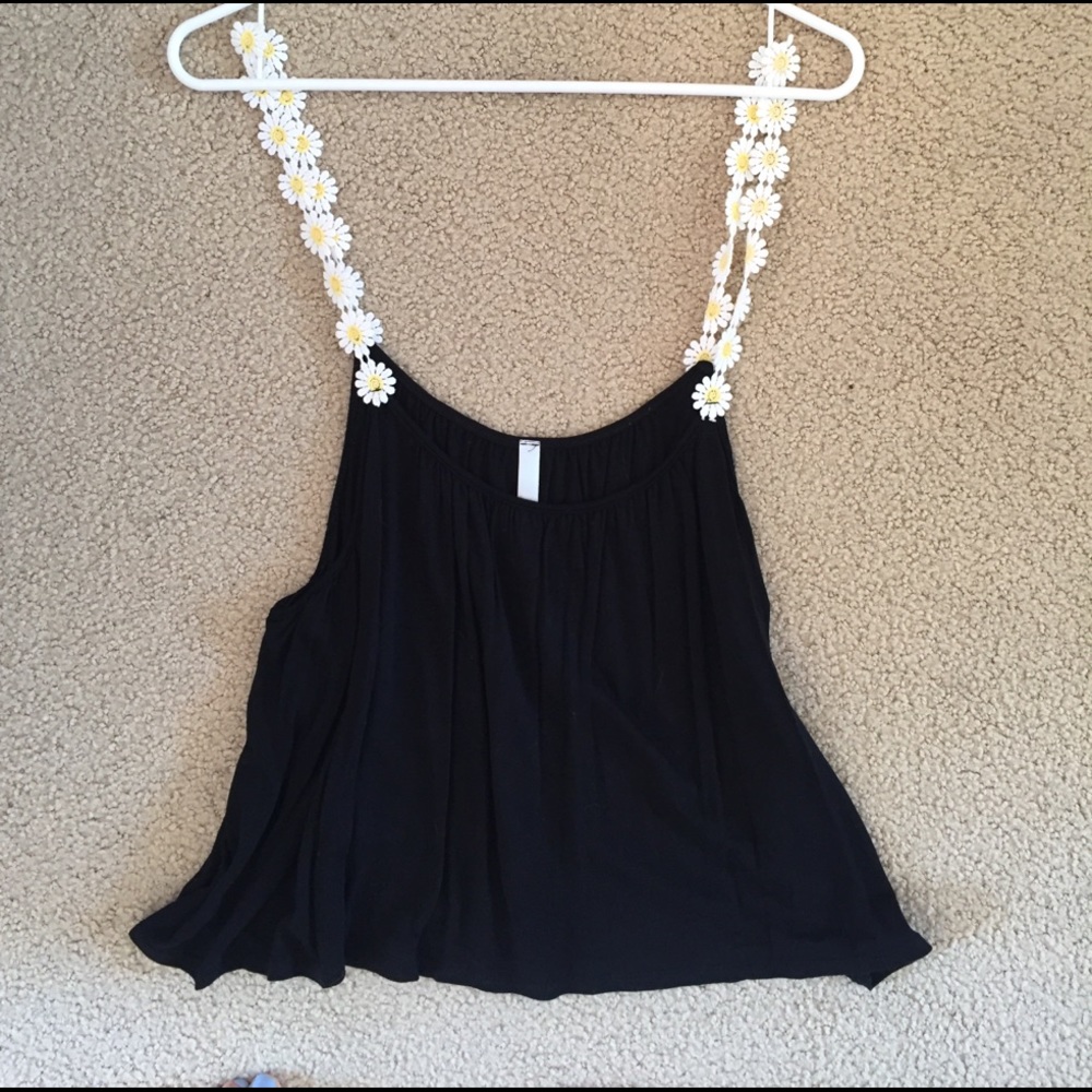 Flowy black tank with daisy straps