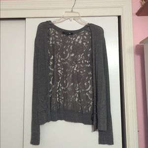 Grey cardigan with lace on back