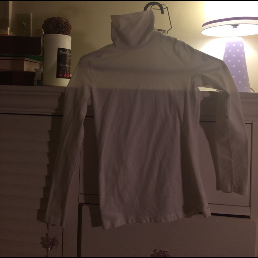A white turtle neck shirt