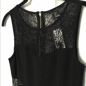 Body con black dress with lace detailing