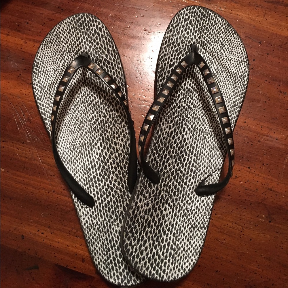 Black and white flip flops