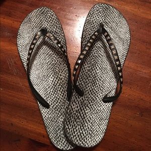 Black and white flip flops
