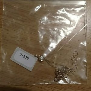 Cubic zirconia and gold pendant necklace