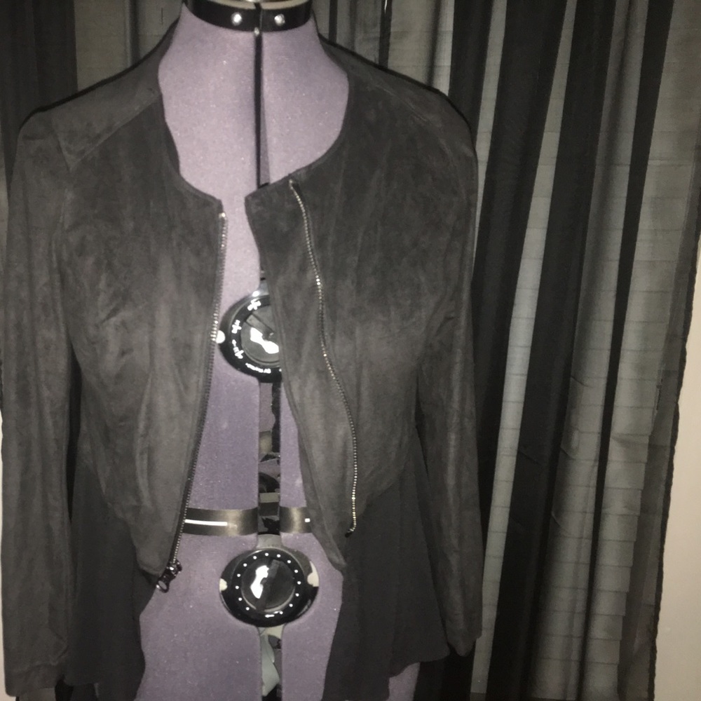 Black fabric jacket w/ Mesh on the bottom. Flow-y