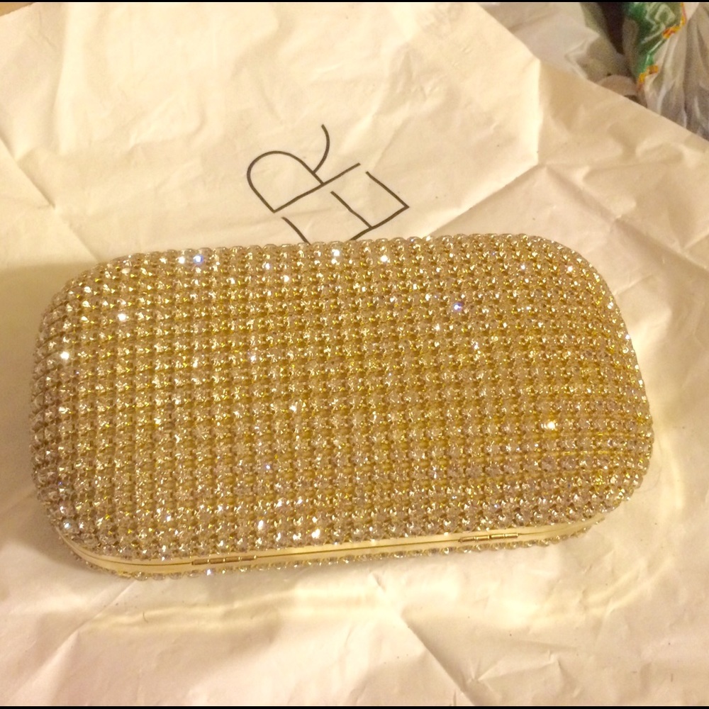Gold evening clutch with crystals