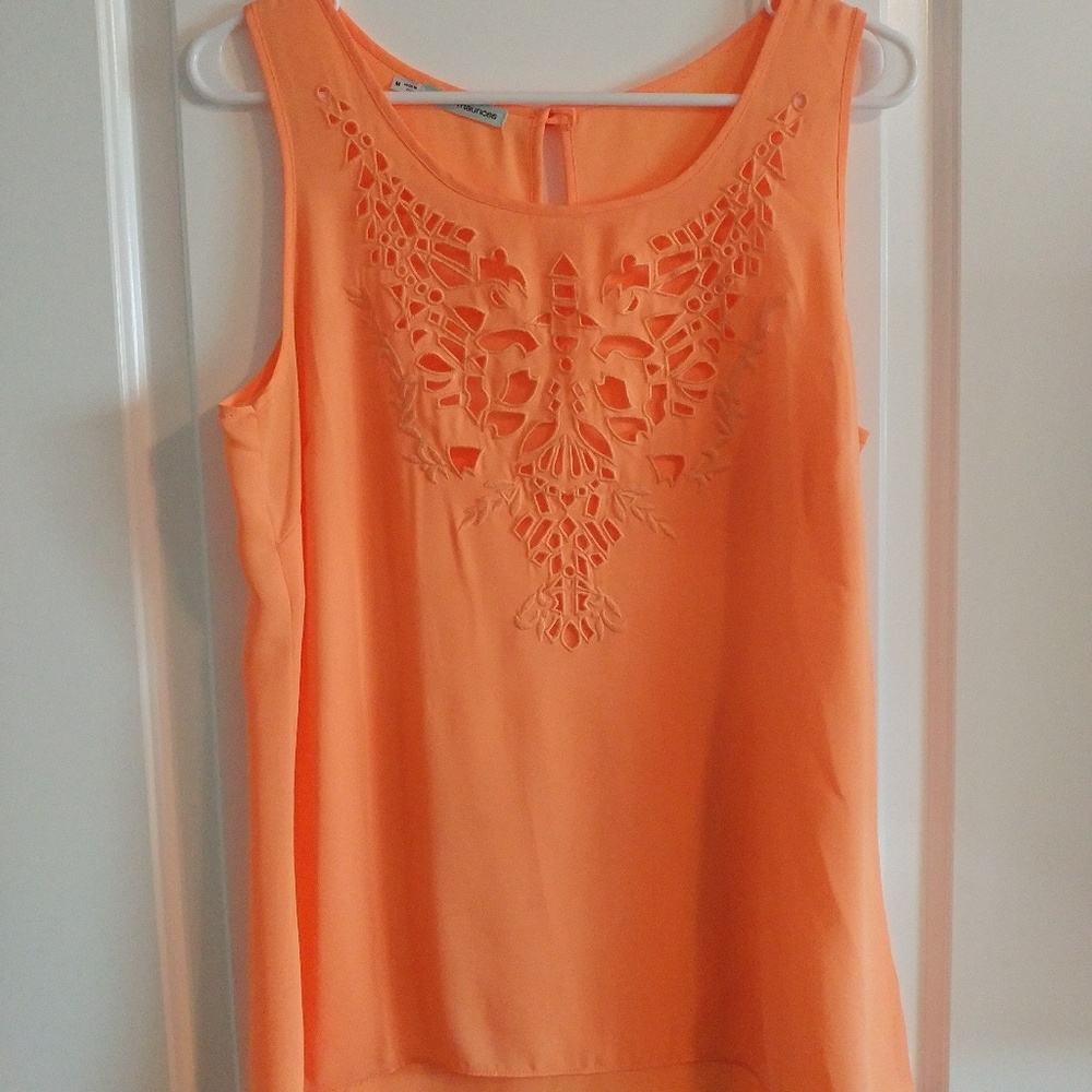 Bright orange cutout tank
