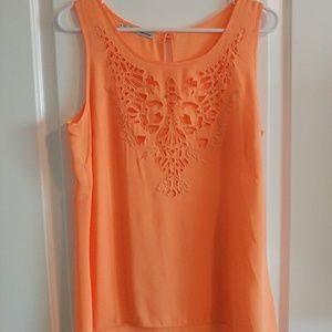 Bright orange cutout tank