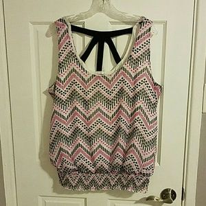 Sleeveless pink and black blouse
