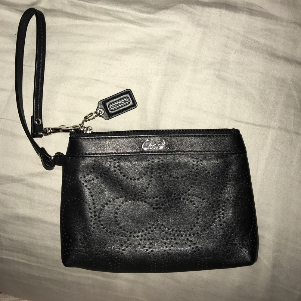 Coach wristlet perfect condition, used 1 time
