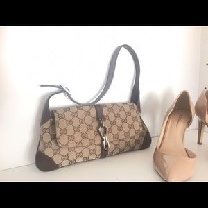 Authentic Gucci Clutch.