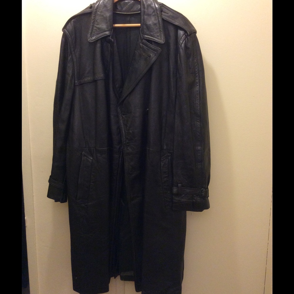 A man's 1970's black long leather coat.