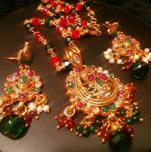 Indian gold plated necklace set.
