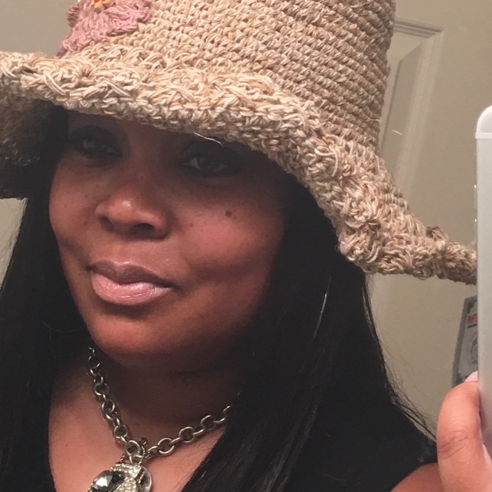 Heavy beige wired brim hat w/embroidered designs