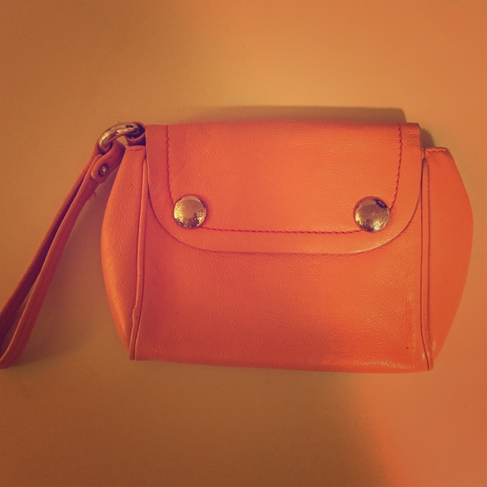 Marc Jacobs orange leather wristlet