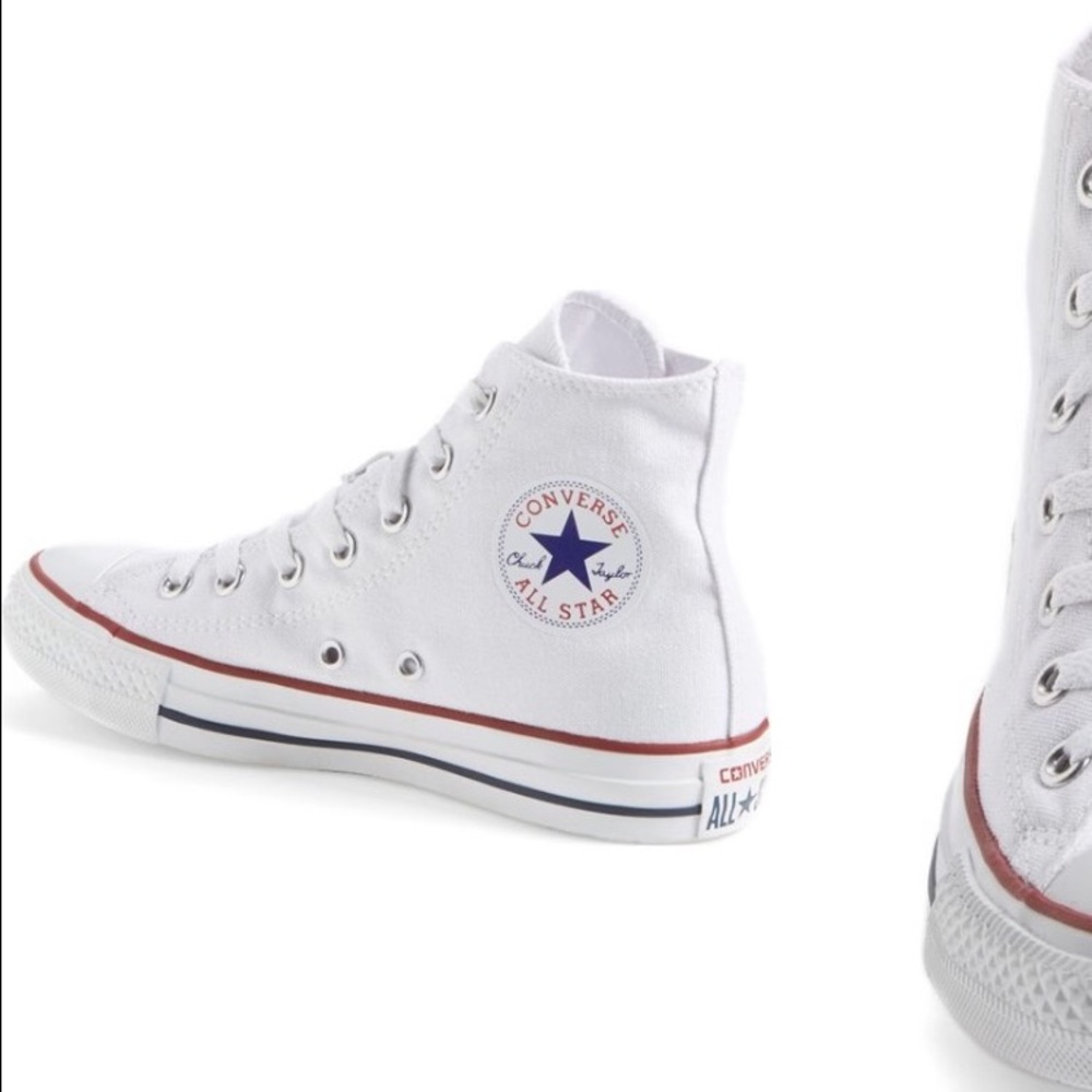 Authentic chuck Taylor white high top converse.