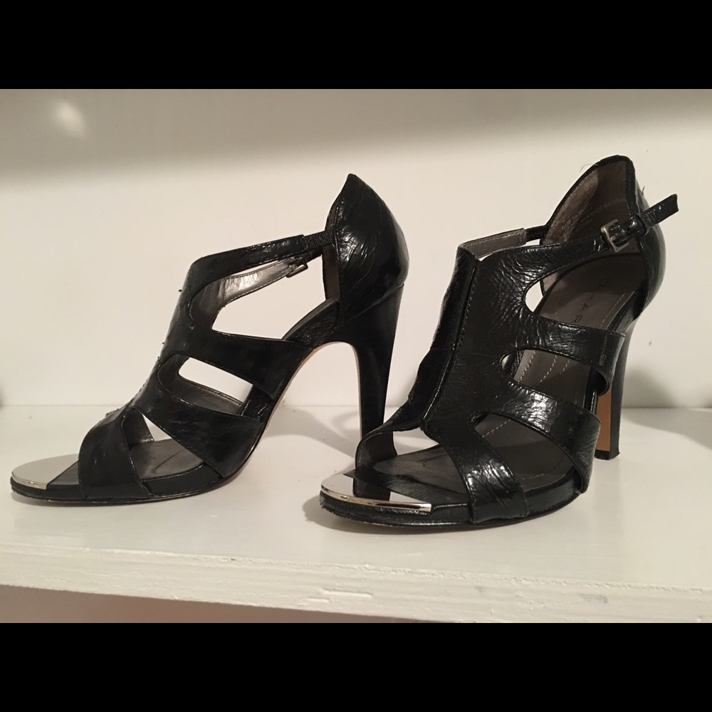 Black leather cut out heels with Silver toe plate!