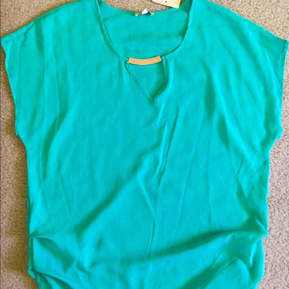 Loose, formal top with gold details.