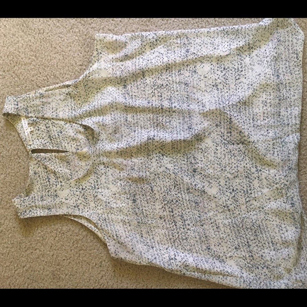 Off-white tank top with tulip back