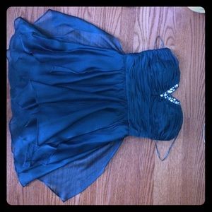 A never worn teal prom/homecoming dress