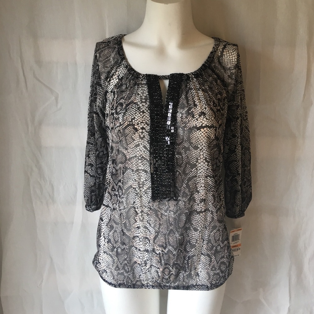 NWT Flattering Animal Print top with sequins SZ Sm