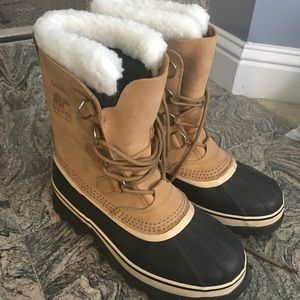 Brand new Sorel Caribou boots.