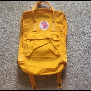 Yellow Fjallraven Kanken backpack