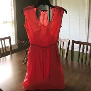 coral dress with white dots
