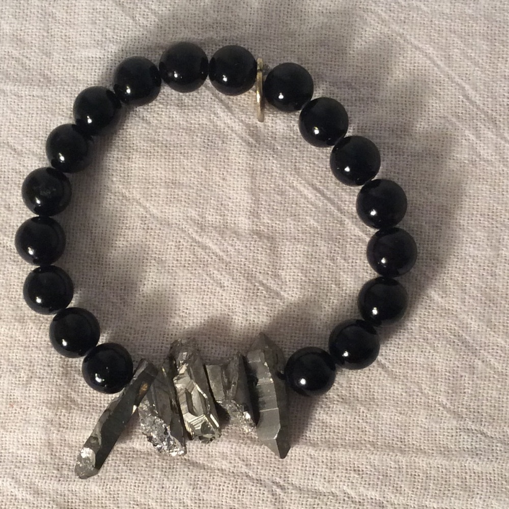 Silver quartz and black glass beads.  Handcrafted